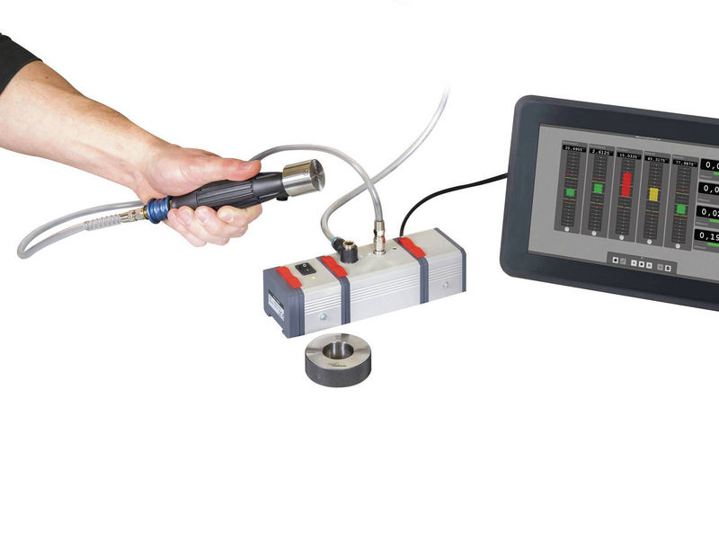 Pneumatic module in use with a nozzle plug gage